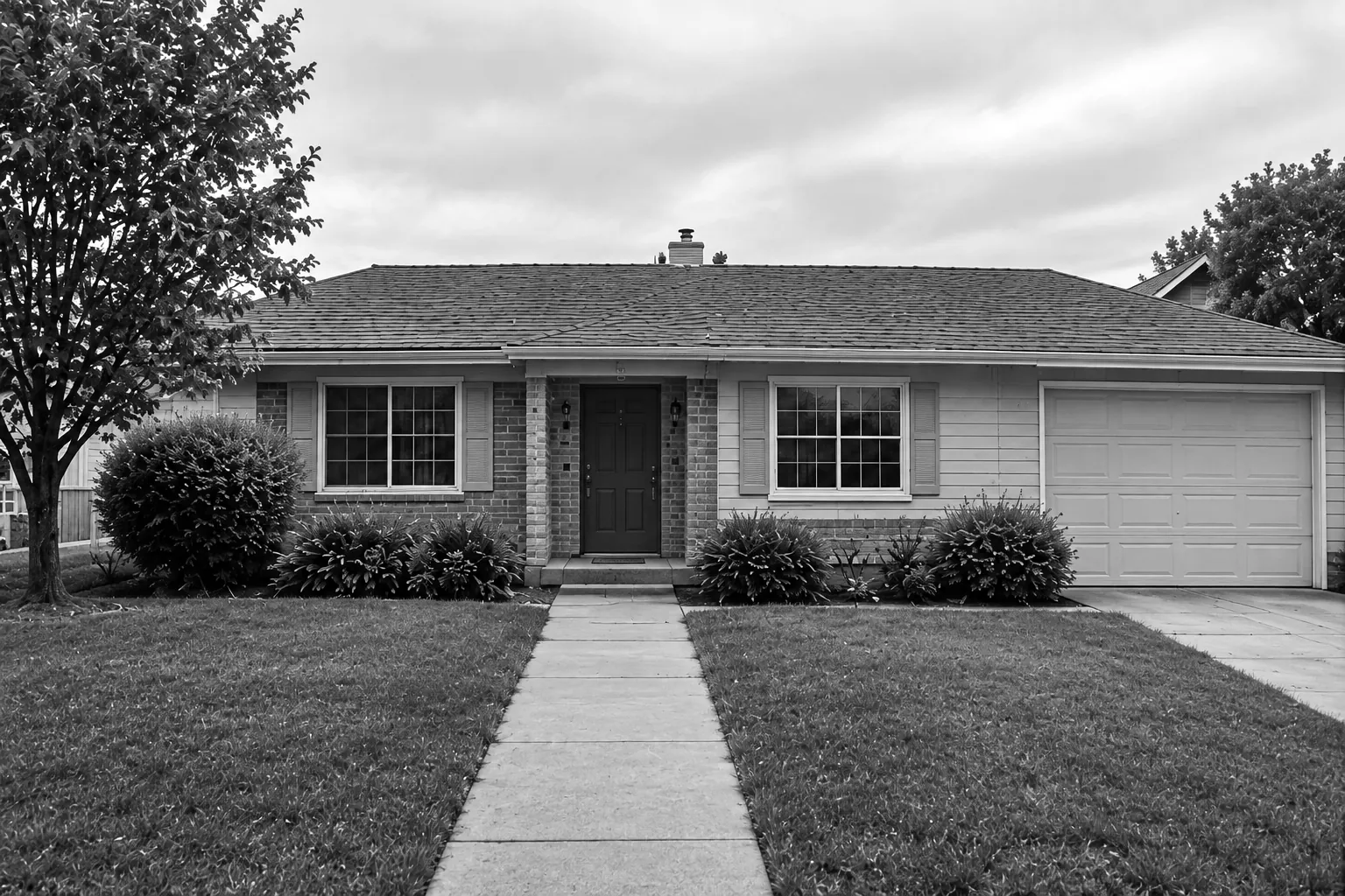 Render of one example single story stucco house with a two car garage, seen from across the street.